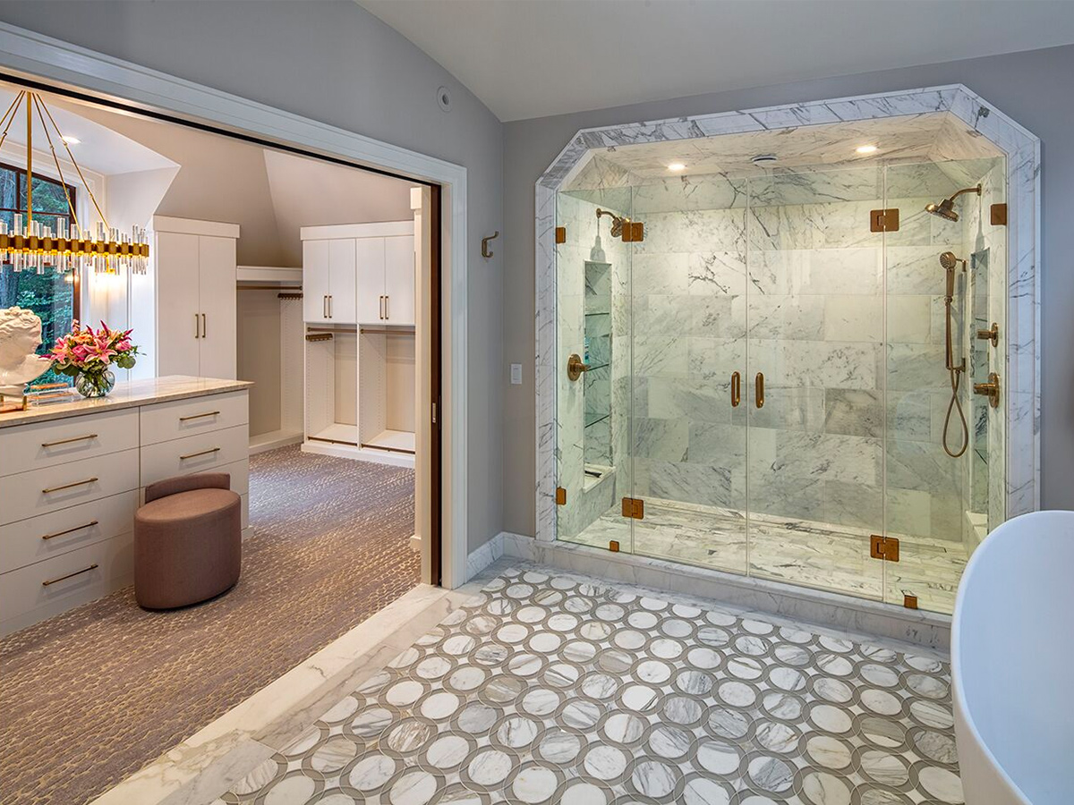 Master bathroom with round floor tile